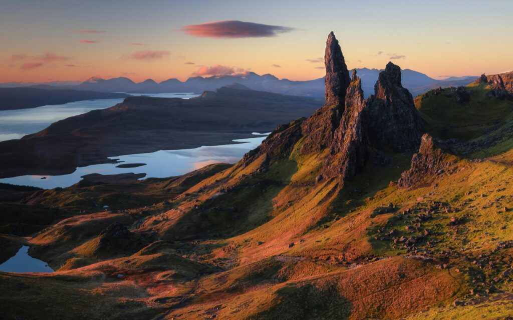 Captivating view of Old Man of Storr at sunrise, showcasing Scotland's iconic landscape.
