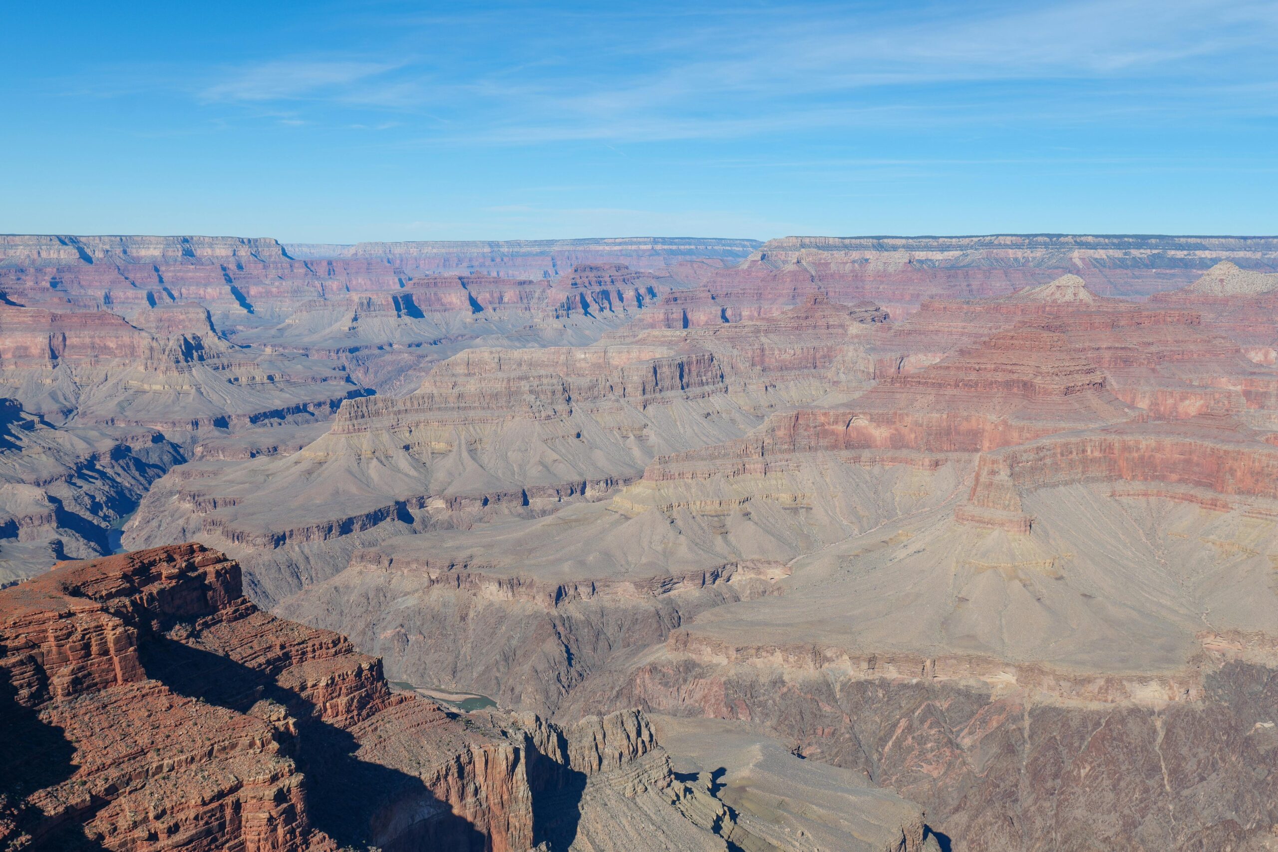 A stunning daytime view of the Grand Canyon's expansive landscape.